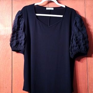 Silky Black Blouse with Flirty Sleeves